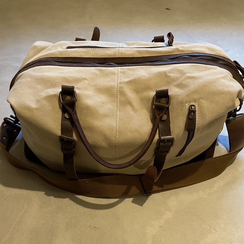 Beige canvas weekender bag
